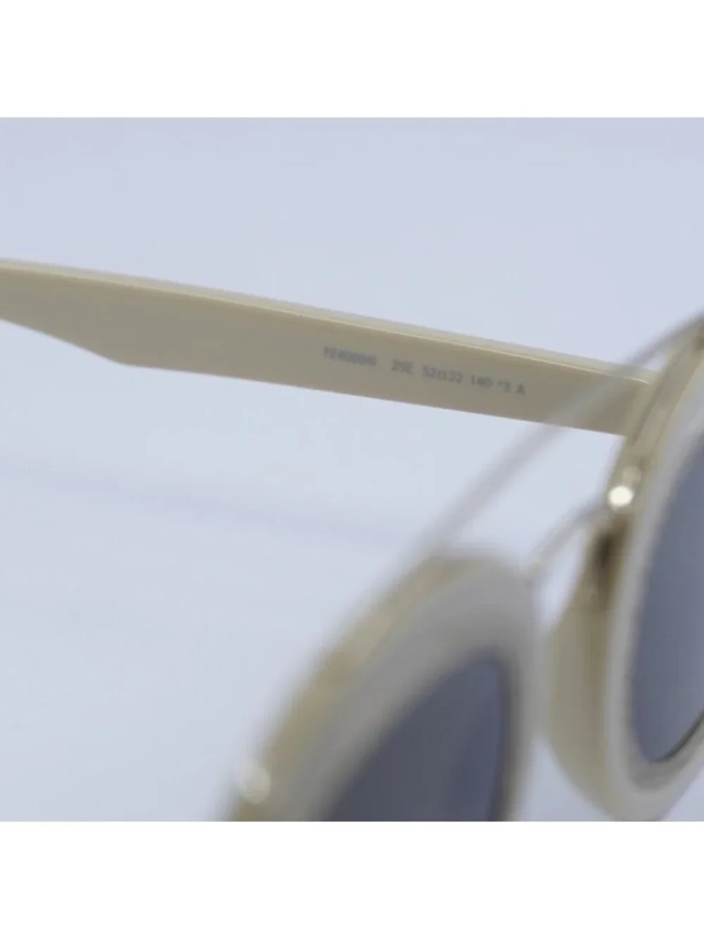 Fendi FE40094I 25E Sunglasses Ivory/Gold Oval Frame, Brown Lenses